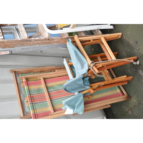 1213 - TWO VINTAGE DECK CHAIRS with striped fabric seats, four ladders, two aluminium, one wooden and one m... 