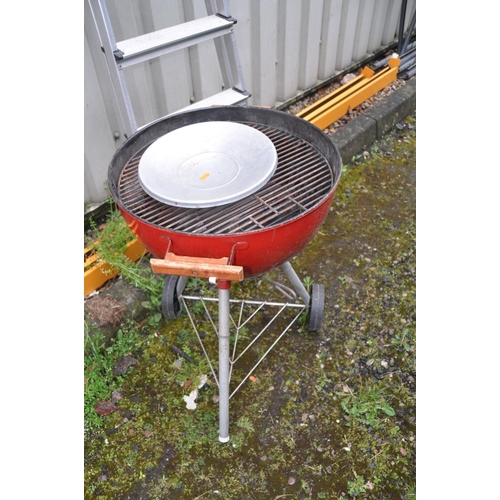 1214 - A WEBER DOMED BARBECUE on stand and an aluminium step ladder (2)