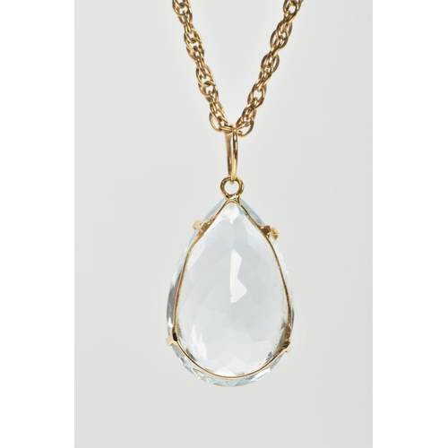 105 - A 9CT GOLD AQUAMARINE PENDANT, a light blue-green pear cut large aquamarine stone, approximate total... 