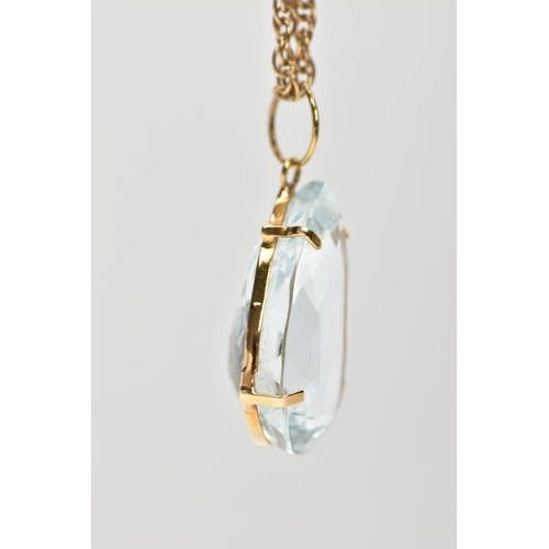 105 - A 9CT GOLD AQUAMARINE PENDANT, a light blue-green pear cut large aquamarine stone, approximate total... 