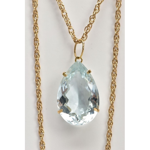 105 - A 9CT GOLD AQUAMARINE PENDANT, a light blue-green pear cut large aquamarine stone, approximate total... 