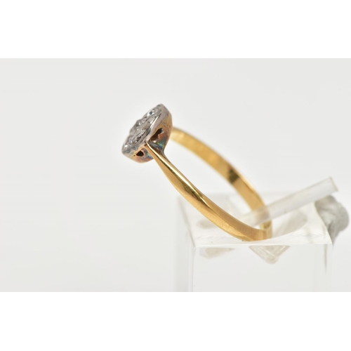 119 - A YELLOW METAL DIAMOND RING, the ring head of a circular design set with three old cut diamonds and ... 