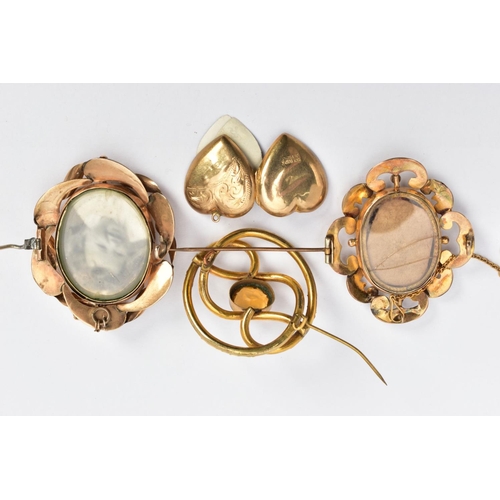 129 - THREE BROOCHES AND A LOCKET PENDANT, to include an oval yellow metal double photograph swivel brooch... 