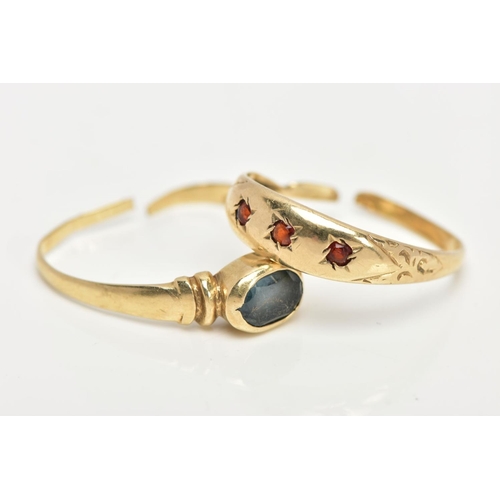 13 - TWO 9CT GOLD RINGS, the first a three stone garnet ring each star set, scroll detailed shoulders to ... 