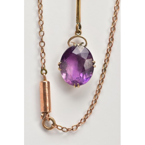 132 - A YELLOW METAL AMETHYST PENDANT NECKLACE, designed with an oval cut amethyst dropper, double four cl... 