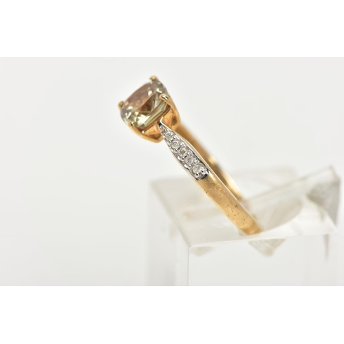 151 - A 9CT GOLD GEM SET RING, designed with a central square cut pale green stone, flanked with diamond d... 