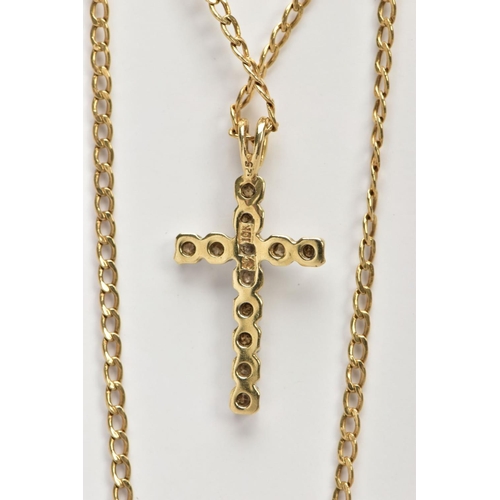 167 - A DIAMOND CROSS PENDANT AND CHAIN, the cross pendant designed with claw set round brilliant cut diam... 