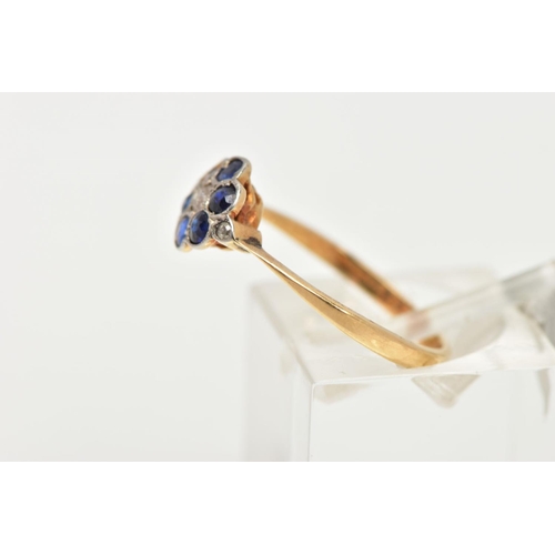 169 - A YELLOW METAL DIAMOND AND SAPPHIRE CLUSTER RING, of a flower design, set with a central single cut ... 