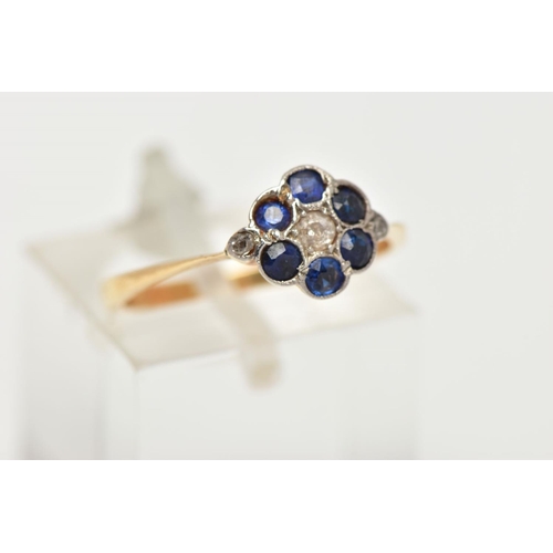 169 - A YELLOW METAL DIAMOND AND SAPPHIRE CLUSTER RING, of a flower design, set with a central single cut ... 