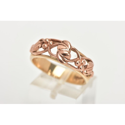 174 - A 9CT GOLD CLOGAU RING, a plain polished yellow gold band with an open work entwined foliage design ... 