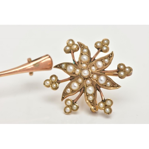 183 - TWO EARLY 20TH CENTRURY GOLD BROOCHES, the first brooch of a yellow gold floral design, set with thi... 