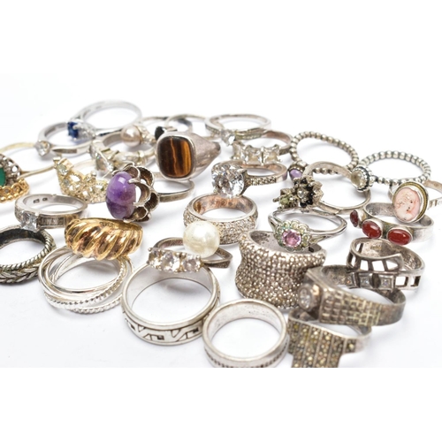 186 - AN ASSORTMENT OF SILVER AND WHITE METAL RINGS, a silver gold plated dome ring, hallmarked Birmingham... 