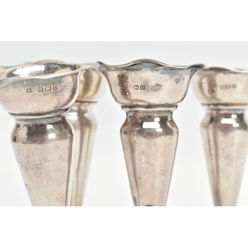 189 - A COLLECTION OF FOUR SILVER POSEY VASES, silver fluted vase with wavey rims, weighted circular bases... 