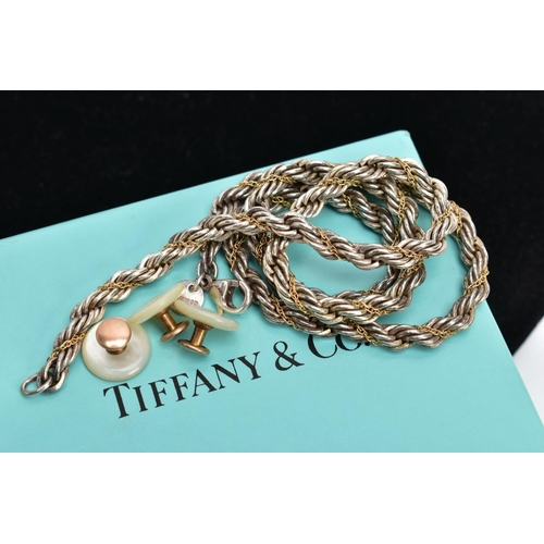 194 - A 'TIFFANY & CO' SILVER ROPE CHAIN, a heavy rope chain entwined with a fine yellow metal chain, fitt... 