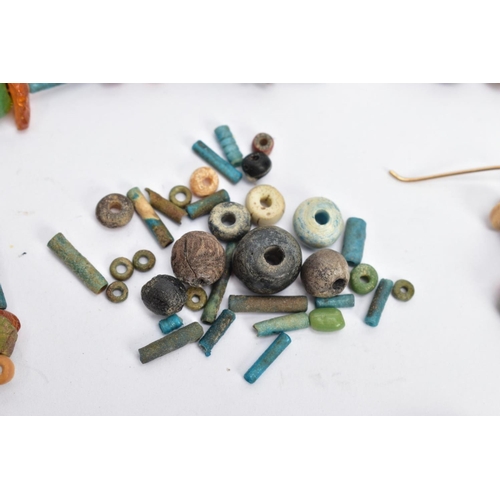 197 - AN ANCIENT EGYPTIAN FAIENCE BEAD NECKLACE, faience and hardstone beaded necklace also featuring a sc... 