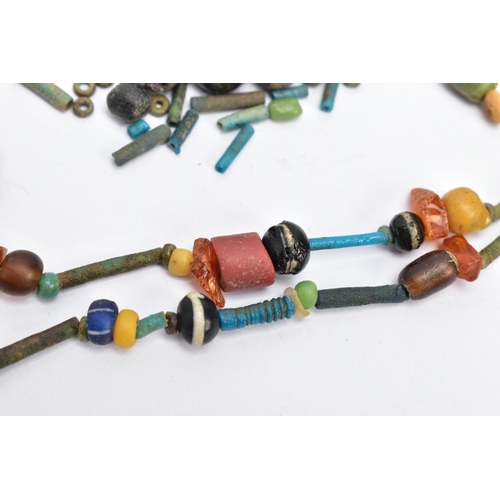 197 - AN ANCIENT EGYPTIAN FAIENCE BEAD NECKLACE, faience and hardstone beaded necklace also featuring a sc... 