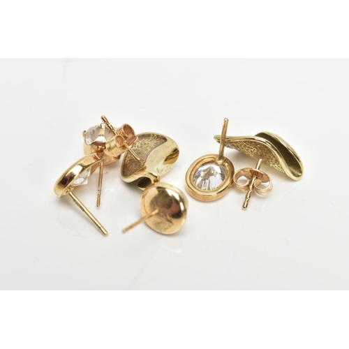 207 - TWO PAIRS OF YELLOW METAL EARRINGS AND TWO SINGLE EARRINGS, to include a pair of twist shape earring... 