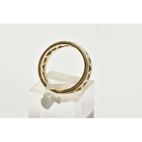 208 - A 9CT GOLD FULL ETERNITY RING, set with blue triangular cut paste and colourless circular cut paste ... 