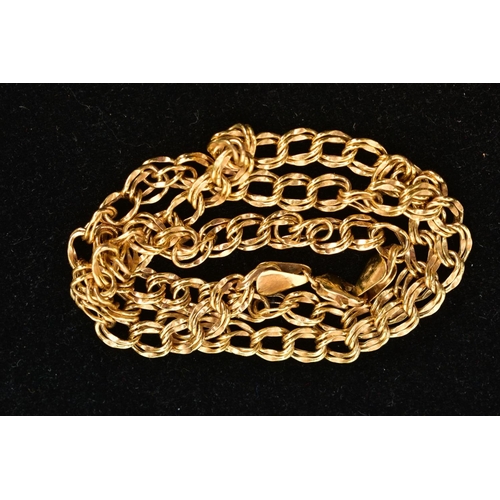 220 - A YELLOW METAL FANCY LINK CHAIN, double circular link chain fitted with a lobster clasp, stamped 9k,... 