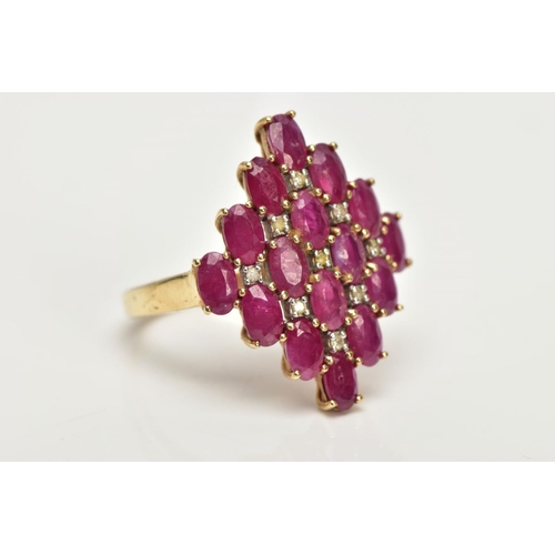 223 - A 9CT GOLD RUBY AND DIAMOND CLUSTER RING, of a lozenge shape, set with a cluster of oval cut rubies ... 