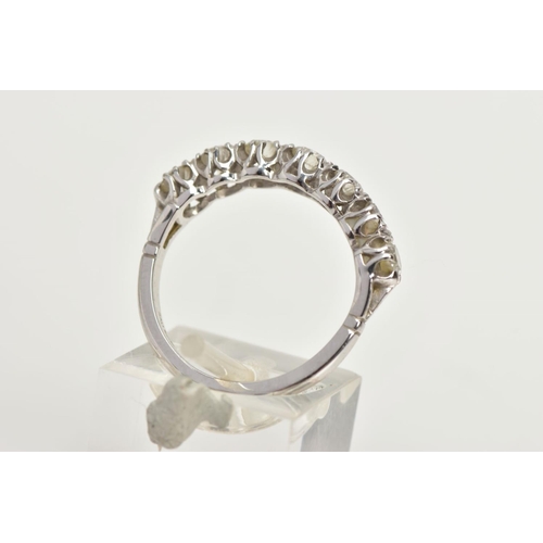 227 - AN 18CT WHITE GOLD DIAMOND HALF ETERNITY RING, set with seven round brilliant cut diamonds in a shar... 