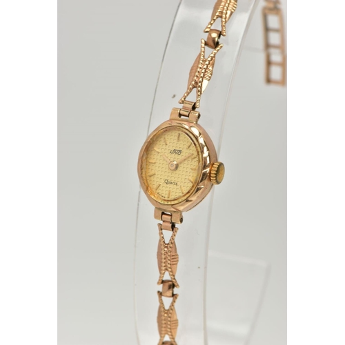 235 - A LADIES 9CT GOLD 'UNO' WRISTWATCH, oval gold dial signed 'Uno, quartz', baton markers, gold tone ha... 