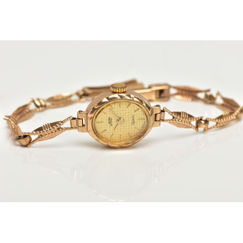 235 - A LADIES 9CT GOLD 'UNO' WRISTWATCH, oval gold dial signed 'Uno, quartz', baton markers, gold tone ha... 