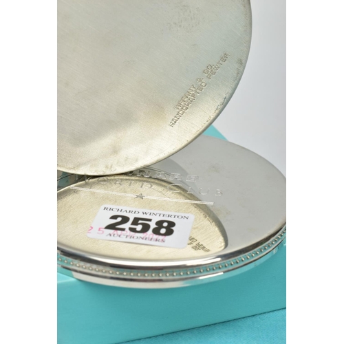 258 - A 'TIFFANY & CO' DISH, a polished round dish detailed with engraved lines and beading on the lid, li... 