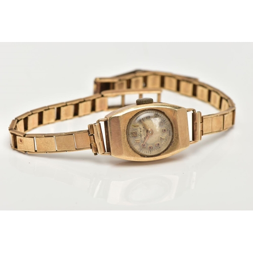 27 - A LADIES 9CT GOLD 'AVIA' WRISTWATCH, hand wound movement, round discoloured dial signed 'Avia 15 jew... 