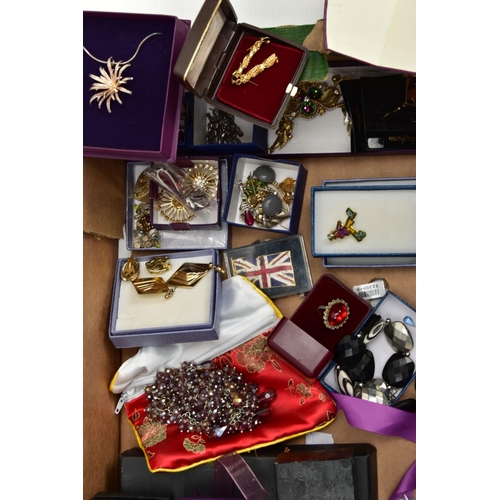 283 - A BOX OF ASSORTED COSTUME JEWELLERY, to include various brooches, chains, pendant necklaces, earring... 