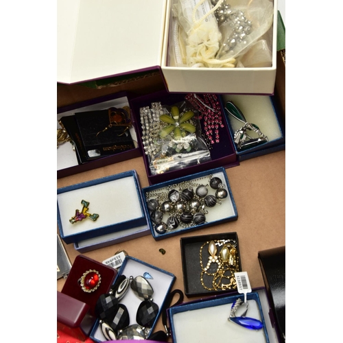 283 - A BOX OF ASSORTED COSTUME JEWELLERY, to include various brooches, chains, pendant necklaces, earring... 