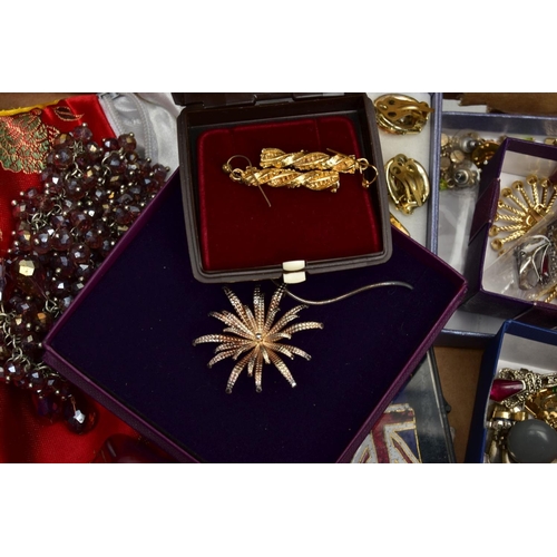 283 - A BOX OF ASSORTED COSTUME JEWELLERY, to include various brooches, chains, pendant necklaces, earring... 