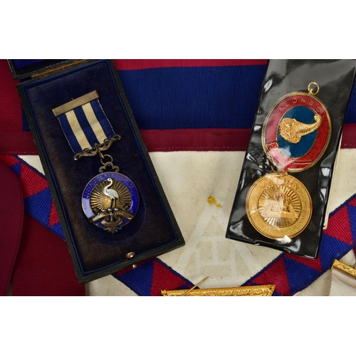 289 - A BOX OF MASONIC REGALIA, to include various sashes and aprons some bearing medallions, various maso... 