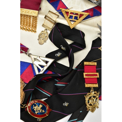 289 - A BOX OF MASONIC REGALIA, to include various sashes and aprons some bearing medallions, various maso... 