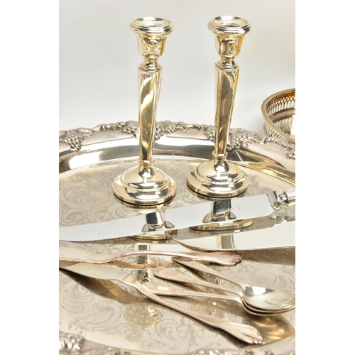 295 - A PAIR OF SILVER CANDLESTICKS AND WHITE METAL WARE, the pair of silver candle sticks with tapered st... 