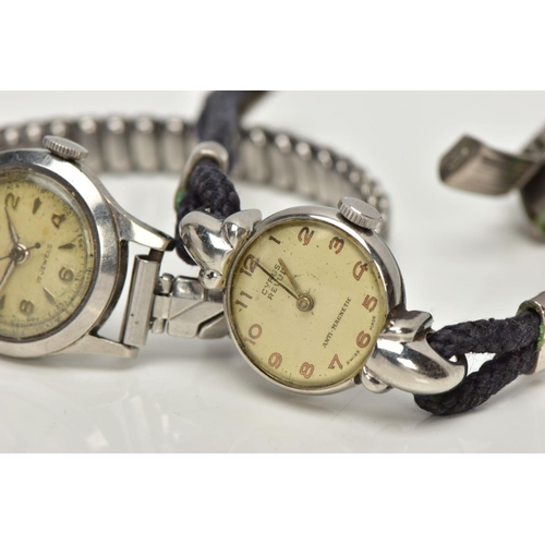 308 - TWO WRISTWATCHES AND A YELLOW METAL BROKEN CHAIN, a stainless steel 'Baume' wristwatch, round discol... 