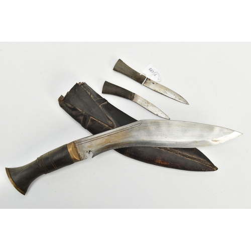 325 - INDIAN SUB CONTINENT KUKRI KNIFE, in original scabbard, together with the two smaller knives making ... 