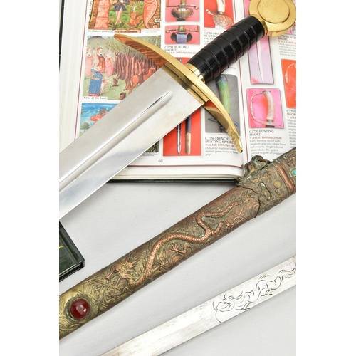 329 - TWO SWORDS one being a modern replica, an Oriental? possibly Chinese, very ornate scabbard, inlaid w... 