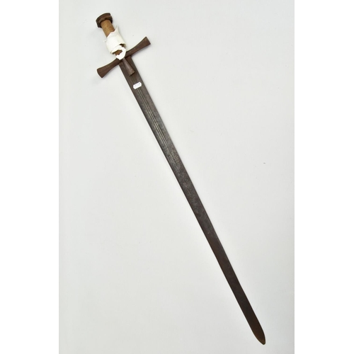 334 - A MEDIEVAL STYLE SWORD, POSSIBLY EUROPEAN IN MANUFACTURE IN THE KASKARAS STYLE, the blade is approxi... 