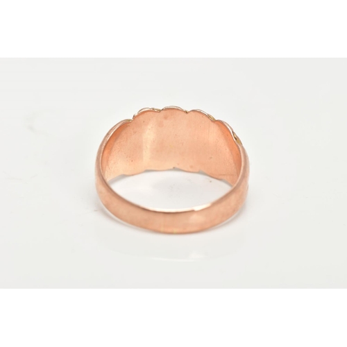 37 - A 9CT GOLD DOME RING, a wide band detailing a floral and scrolling pattern, approximate width 10mm, ... 