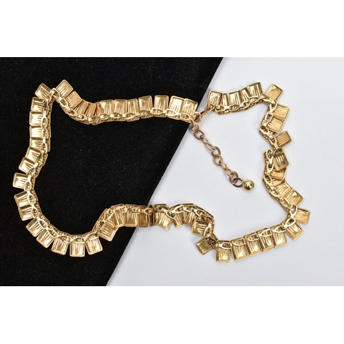 38 - A 9CT GOLD CLEOPATRA NECKLACE, textured gold panels interlinked together, fitted with a spring clasp... 