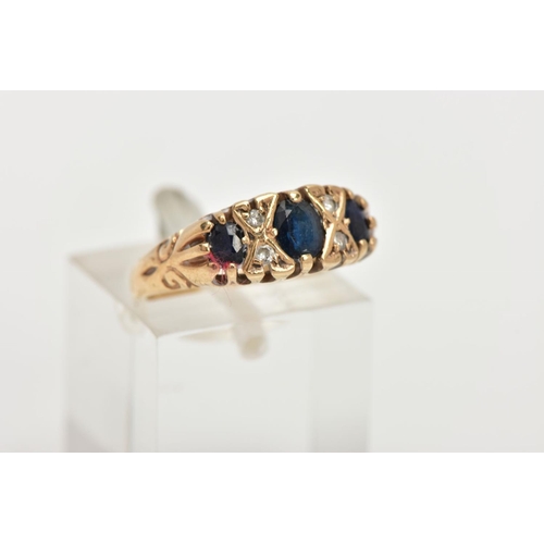 50 - A LATE 20TH CENTURY SAPPHIRE AND DIAMOND BOAT RING, centring on an oval cut deep blue sapphire inter... 