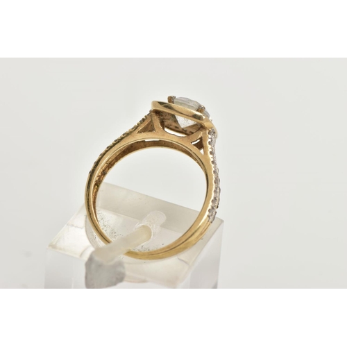 60 - A 9CT GOLD CUBIC ZIRCONIA DRESS RING, centring on a colourless circular cut cubic zirconia, within a... 