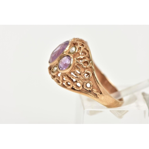 61 - A YELLOW METAL AMETHYST AND SEED PEARL DRESS RING, centring on an oval cut amethyst milgrain collet ... 