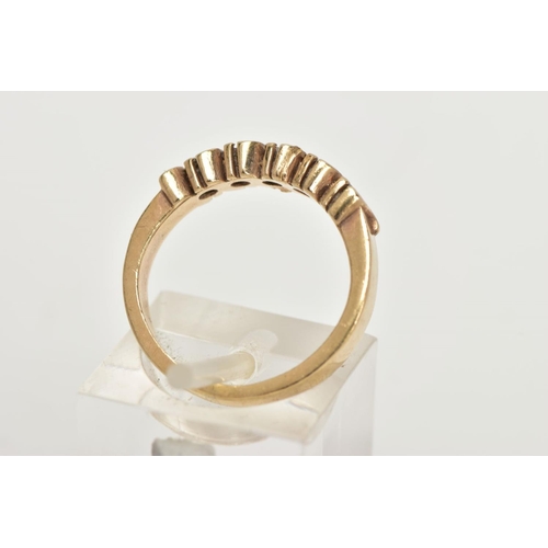 65 - A 9CT GOLD HALF HOOP RING, designed with a row of three circular cut cubic zirconia interspaced with... 