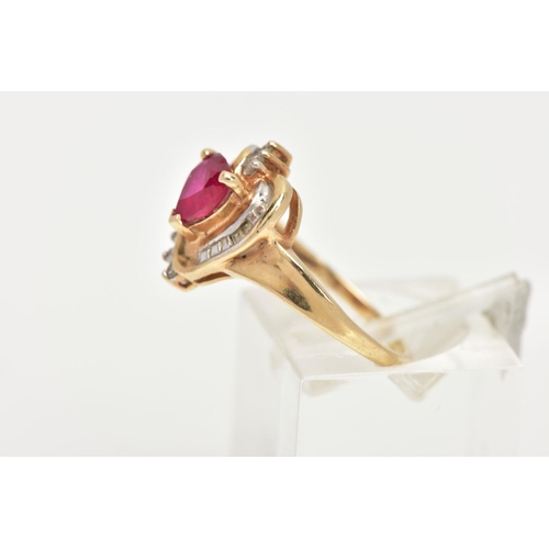 66 - A YELLOW METAL GEM SET RING, of a heart design set centrally with a synthetic heart cut ruby, in a s... 