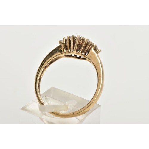 67 - A 9CT GOLD CUBIC ZIRCONIA RING, of a lozenge shape set with a cluster of colourless cubic zirconia s... 