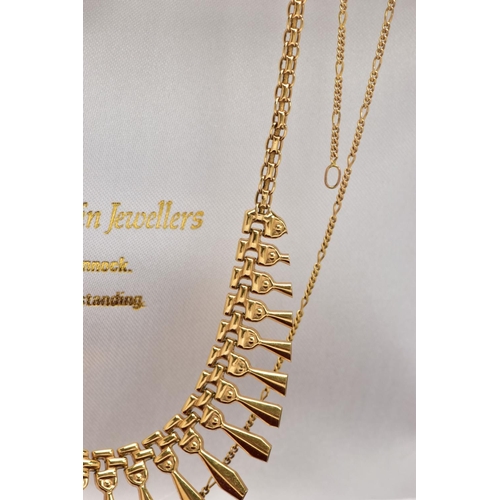 7 - A 9CT GOLD CLEOPATRA NECKLACE AND CHAIN, a yellow gold fancy link chain, fitted with graduated yello... 