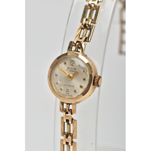 73 - A LADIES 9CT GOLD 'AVIA' WRISTWATCH, movement requires some attention, round silver dial signed 'Avi... 