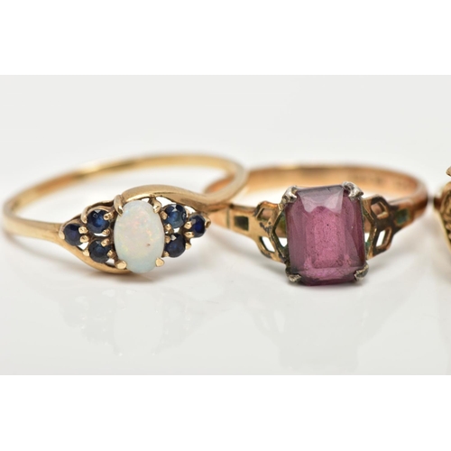 78 - FOUR 9CT GOLD GEM SET RINGS, to include an opal and blue sapphire ring, a ruby and cubic zirconia ma... 